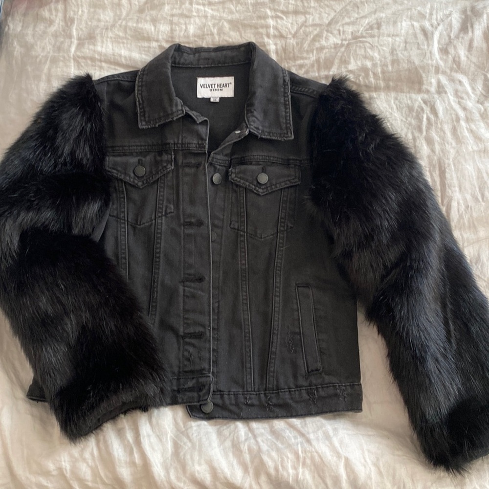 Black denim jacket with fur sleeves